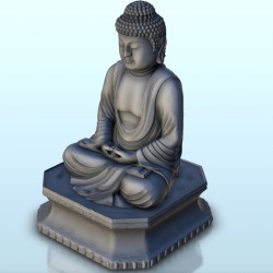 Statue of Buddha sitting in...