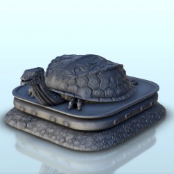 Statue of turtle on carved...